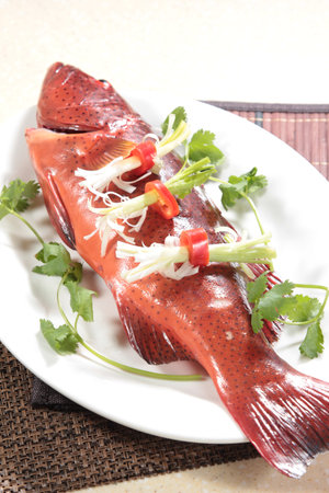 A cuisine photo of steamed fish