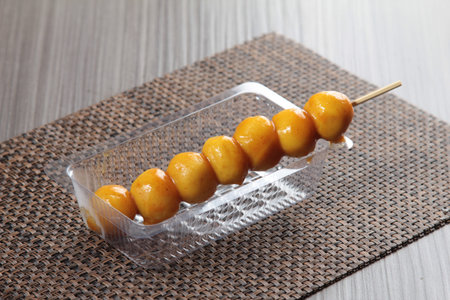 A cuisine photo of curry fish ball