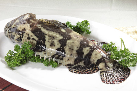 A cuisine photo of steamed fish