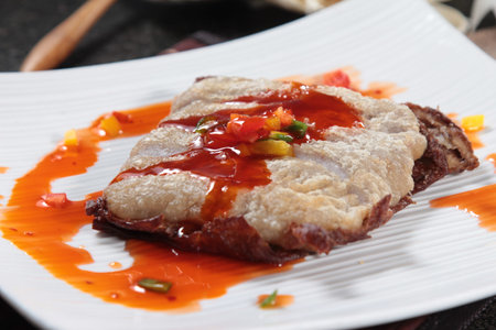 A cuisine photo of deep fried fish