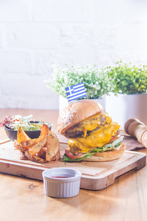 a cuisine photo of ham burger and potato friesの写真素材