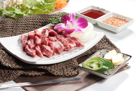 a cuisine photo of raw beefの写真素材