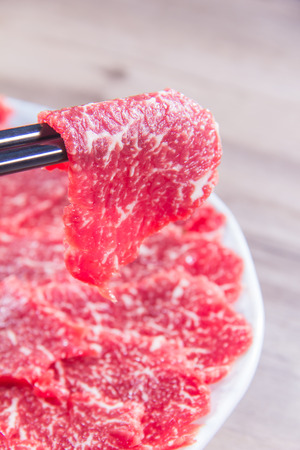 a cuisine photo of raw beefの写真素材