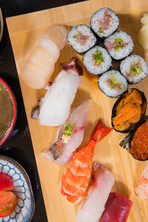 Sushi set on a wooden board, japanese food styleの写真素材