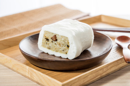 Exquisite Chinese dim sum glutinous rice buns - chinese bun on wood plate.の写真素材