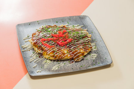Authentic local Japanese cuisine Osaka style okonomiyakiの写真素材