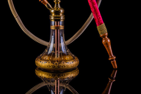 Hookah on a black background with reflection. close up.