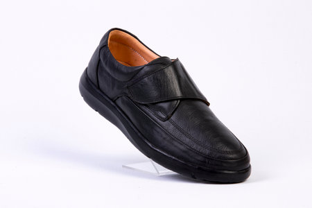 Men's black leather shoes on a white background. isolateの素材