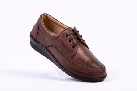 Brown leather man's shoes on a white background. isolated.の素材