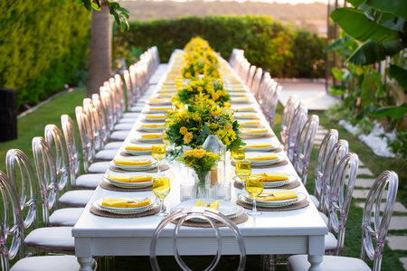 Wedding Banquet Table Decorated with Yellow Flowers.の素材