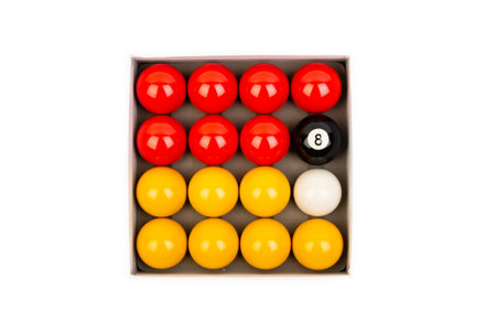 Billiard balls in a box on a white background. Top view.の素材
