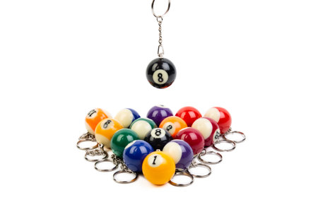 Billiard balls on a chain isolated on white background. pool game.の素材