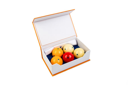 Billiard balls in a box on a white background. isolatedの素材