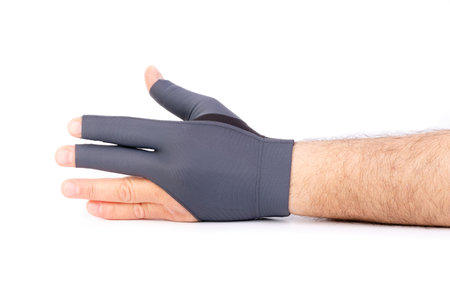 Man's hand in black medical glove. Isolated on a white background.の素材