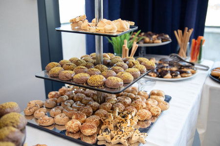 Catering buffet with variety of food snacks and appetizers.の素材