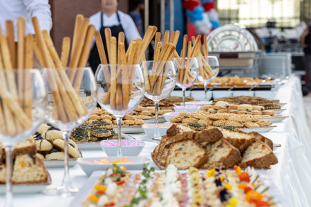 catering buffet with variety of snacks and appetizers at luxury event