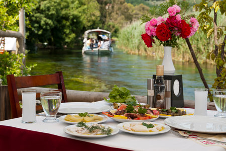 Romantic dinner on the bank of the river in Provenceの写真素材