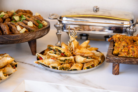 catering buffet with different food snacks and appetizers on table