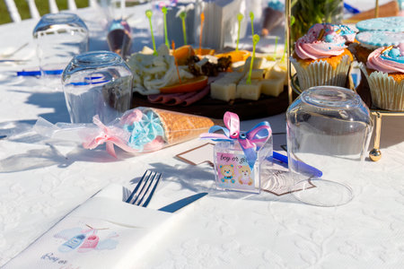 Cupcakes on a table at an outdoor wedding party, selective focusの写真素材