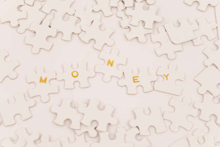 Representation of the puzzle of money or financesの写真素材