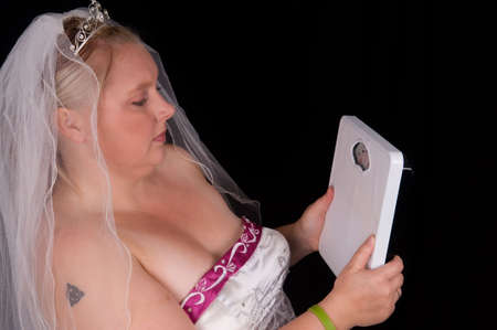 Young bride trying to lose weight for her weddingの写真素材
