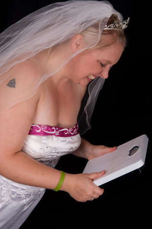 Young bride trying to lose weight for her wedding, unhappy with the resultの写真素材