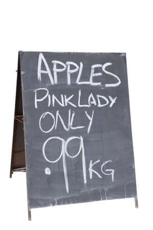 Sandwich board advertising pink lady apples for saleの写真素材