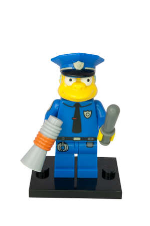 ADELAIDE, AUSTRALIA - August 11 2014:A studio shot of a Chief Wiggum Lego minifigure from the animated series The Simpsons. Lego is extremely popular worldwide with children and collectors.のeditorial素材