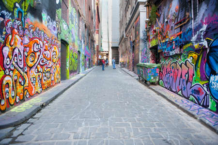Melbourne, Australia - August 28, 2014: People visiting the famous Hosier Lane in Melbourne. The Laneway is full of street art from local and international artists and attracts many thousands of visitors.のeditorial素材
