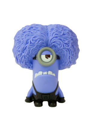Adelaide, Australia - May 04, 2015: A studio shot of a Purple Minion figurine from the movie series Despicable Me issued by McDonalds with Happy Meals. Extremely popular movie series worldwide with children.のeditorial素材