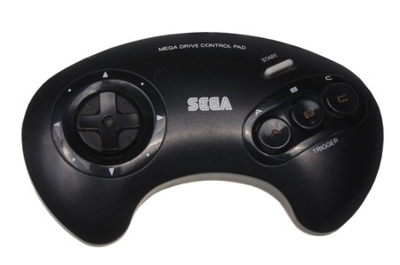 Adelaide, Australia - February 23, 2016: A studio shot of a sega mega drive game controller. A...