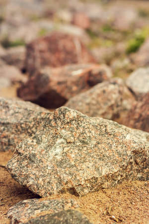 A large pile of limestone debris on the seashore.の写真素材