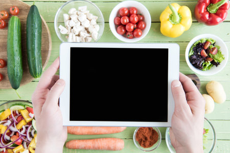 person holding digital tabletの写真素材