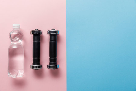 top view dumbbells bottle waterの写真素材