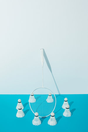badminton racket shuttlecocks blue paperの写真素材