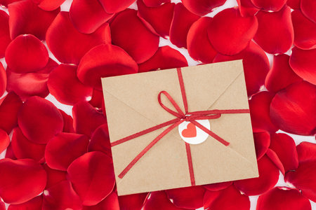 top view envelope ribbon red