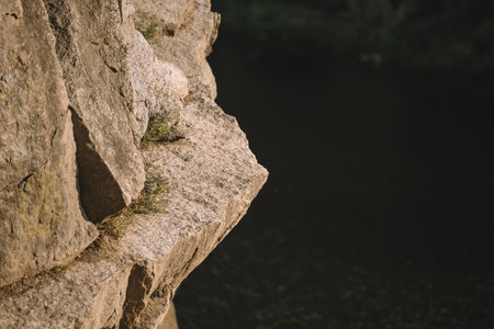 selective focus rocky cliff river