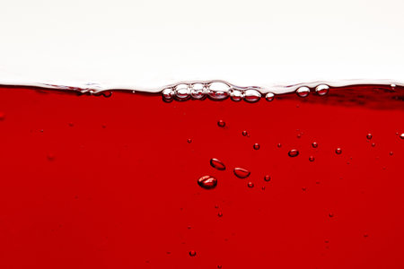 red bright liquid bubbles surface