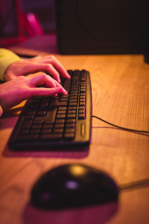 cropped view gamer using computerの写真素材