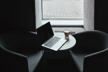 laptop blank screen cup coffee