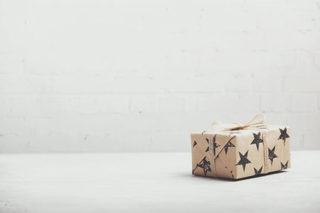 Gift box in craft paper, creative and zero waste gift wrappingの写真素材