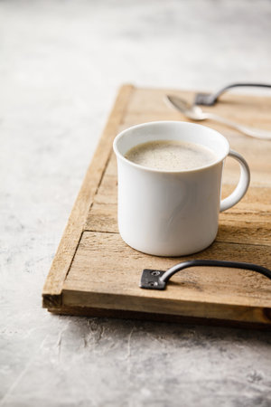 A cup of coffee on light grey backgroundの写真素材