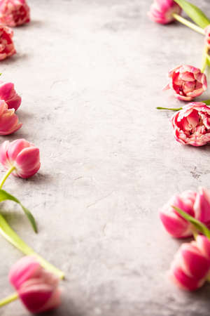 Spring flowers and Easter decorations on shabby chic backgroundの写真素材