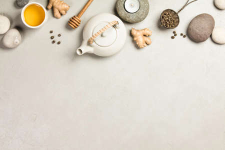 Asian tea set and spa stones on concrete backgroundの写真素材