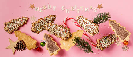 Christmas gingerbread cookies in the shape of a Christmas tree falling or flying in motionの写真素材