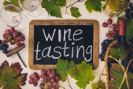 Wine composition on rustic background, flat lay, top viewの写真素材