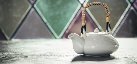 Tea composition near the old window, space for text