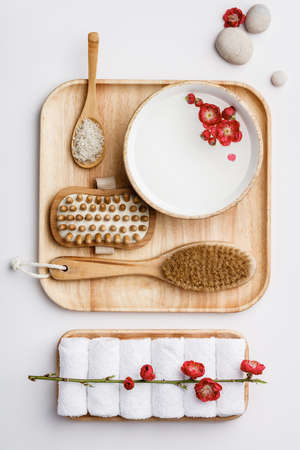 Spa treatment concept, flat lay composition with natural cosmetic products and massage brushesの写真素材