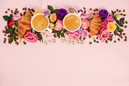 Morning coffee, croissants and a beautiful flowers . Flat lay style.の写真素材