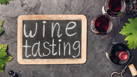 Wine testing concept on dark backgroundの写真素材
